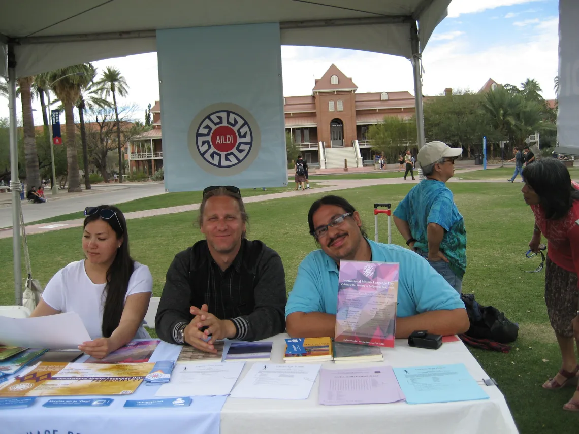 2016 AILDI IMLD booth on the University Mall (Tatiana Degai, Tyler Peterson and Rolando Coto)